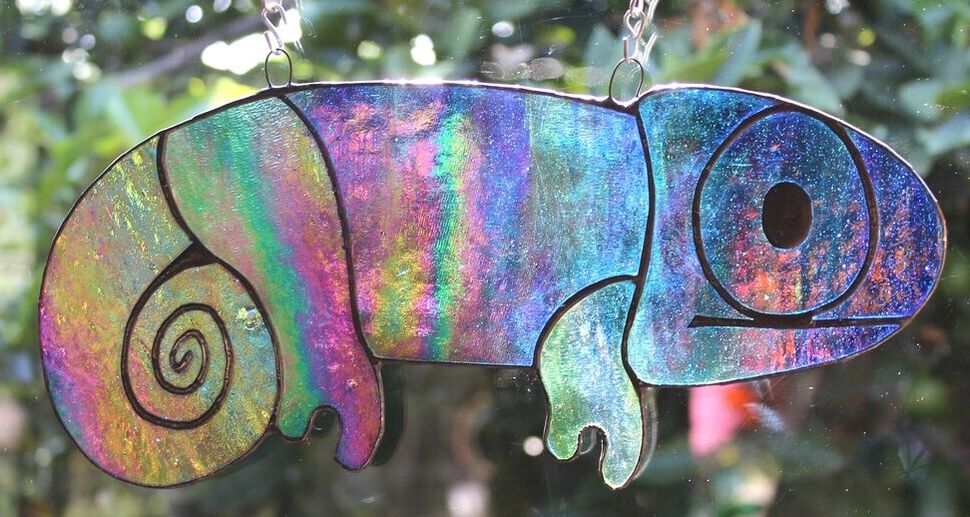 Large chameleon, blue and green with pink iridescence